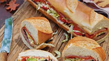 Sub sandwiches on cutting board