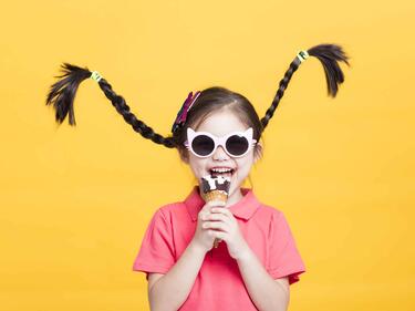 Little girl with crazy hair in braids