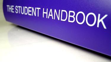 The Student Handbook Purple Binder