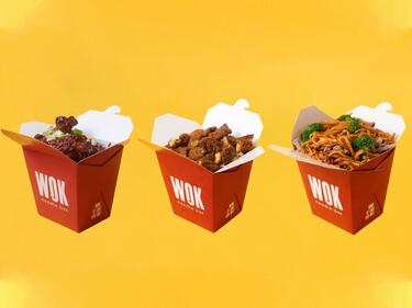 three boxes of noodles on yellow background